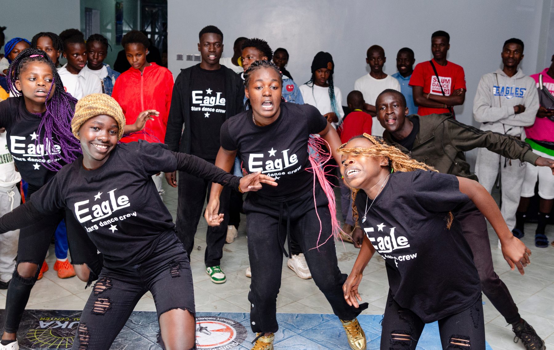 Youth dance exchange energy in Kibera